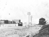 View of the village of Carlstadt (later called Alderson), showing the main street, with the Carlstadt Hotel facing the railway depot where a train has pulled in. Courtesy of the Esplanade Archives
